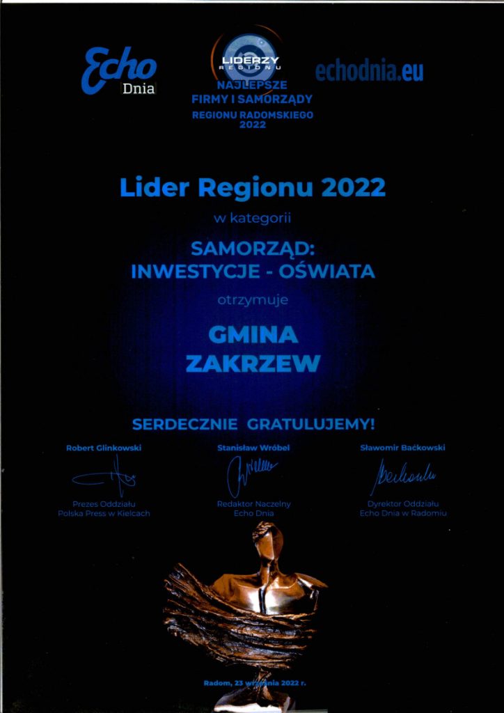 Zdjęcie przedstawia list gratulacyjny z wizerunkiem statuetki, podpisami oraz tytułem Lider Regionu 2022 w kategorii Samorząd: Inwestycje-Oświata otrzymuje Gmina Zakrzew